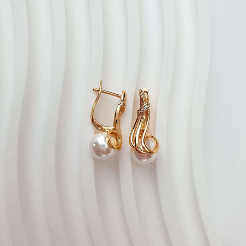 Sieviešu auskari ar vienkrāsainu dizainu un pērles akcentu