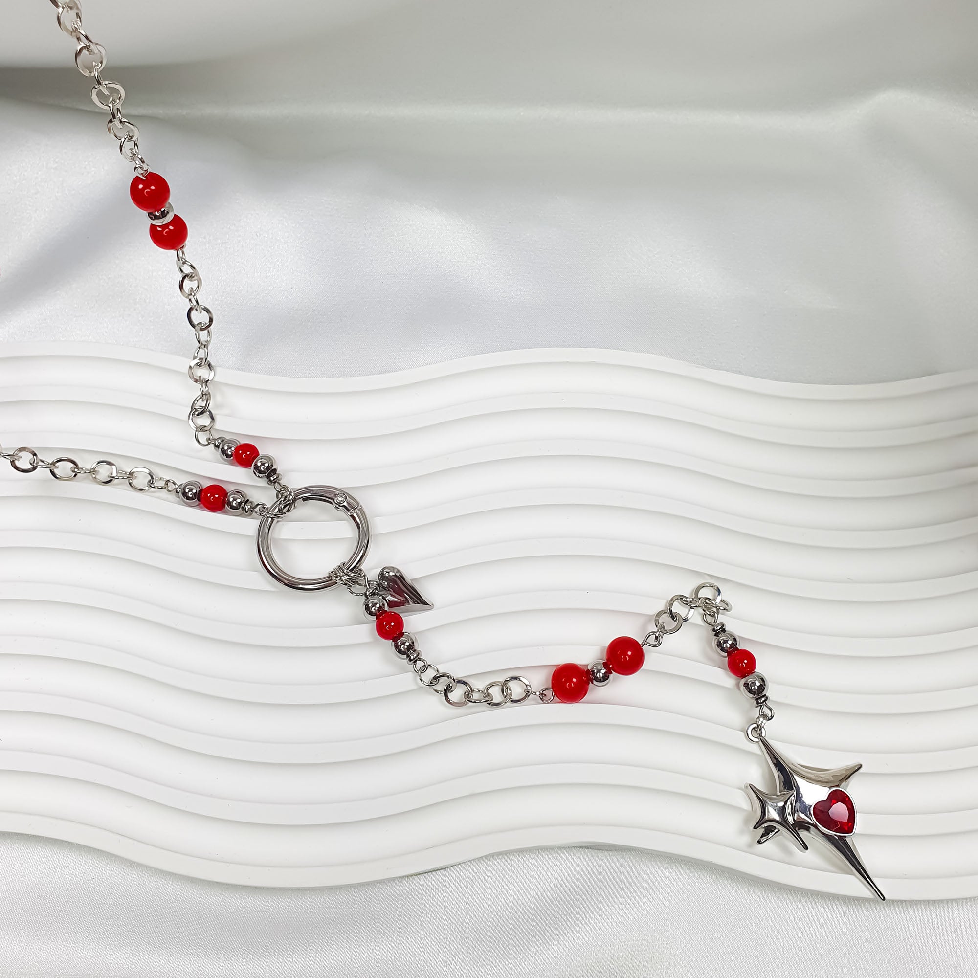 Medicīniskā tērauda ķēde ar priekšējo aizdari un lejupvērstiem kuloniem