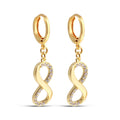 Zelta toņa auskari ar bezgalības simbolu un cirkoniem