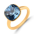 Gredzens ar 13 mm zilu kristālu no medicīniskā zelta ar 18K pārklājumu