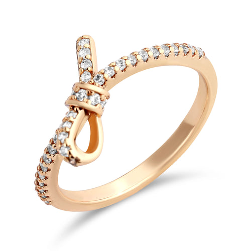 Apzeltīts gredzens ar kristāliem un mezgla motīvu