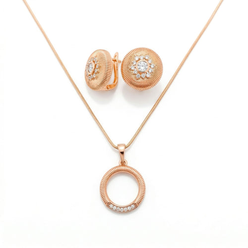 Apzeltīts rotu komplekts "Saules aplis" ar rievotu virsmu un baltiem cirkoniem